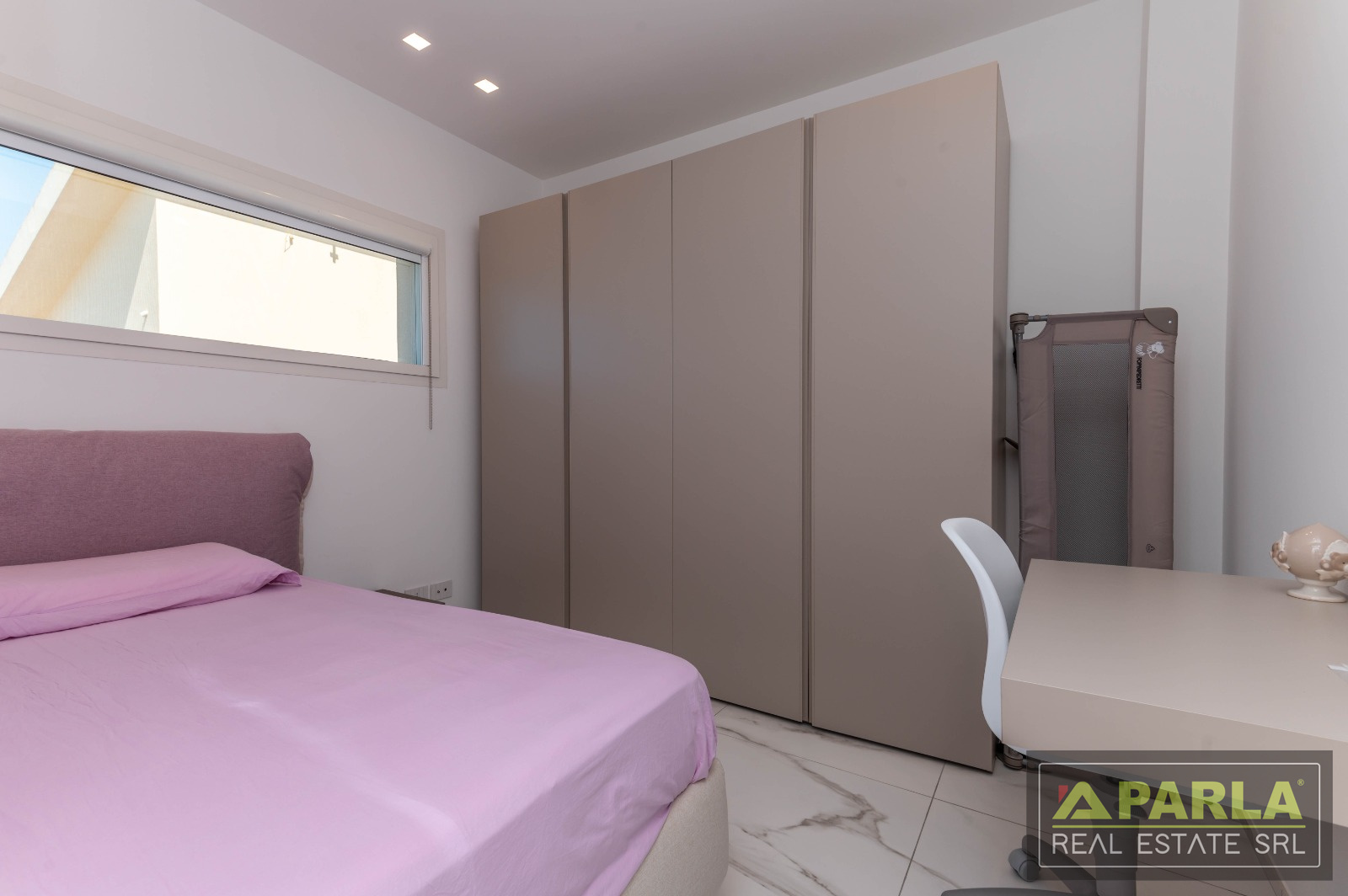 Bedroom with fitted wardrobe